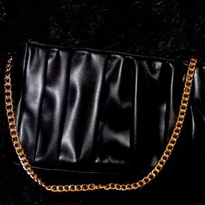 Black purse gold handle